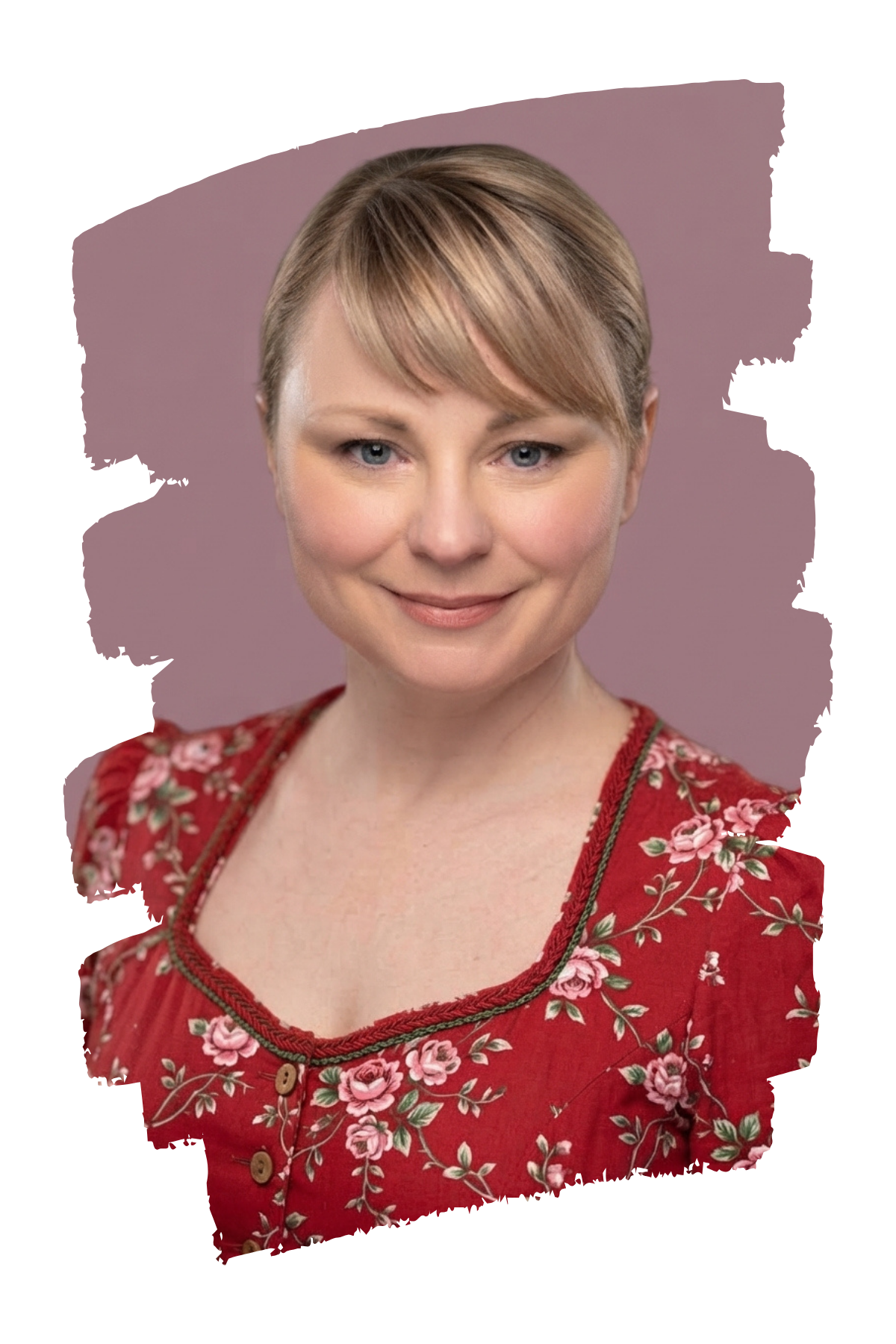 Yvonne Schütt, Autorin und Illustratorin, lächelt freundlich in die Kamera, trägt eine rot-geblümte Bluse